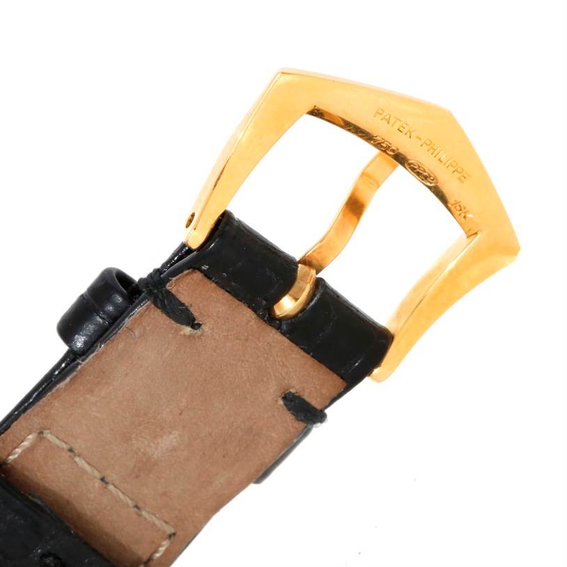 The image shows a close-up angle of the buckle and strap of a Patek Philippe Calatrava 5022 Men's Yellow Gold Champagne Dial 5022 Men's Yellow Gold Champagne Dial watch.