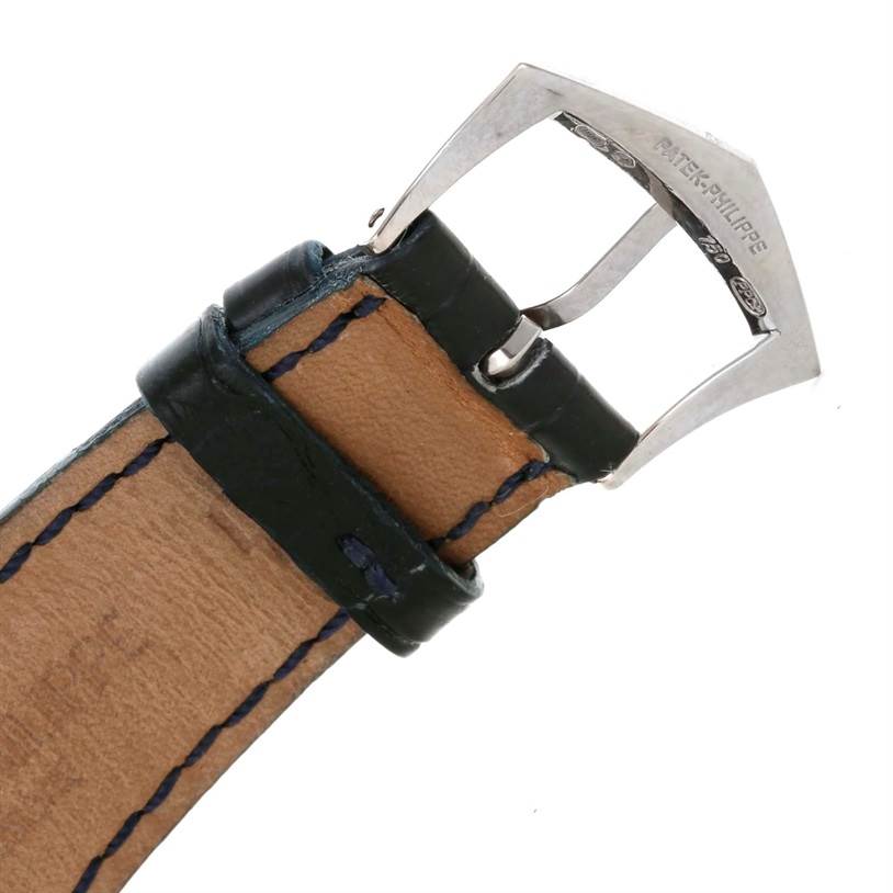 This image shows the buckle and leather strap of a Patek Philippe Complications 3802R Men's White Gold Silver Dial 3802R Men's White Gold Silver Dial watch from a close-up angle.