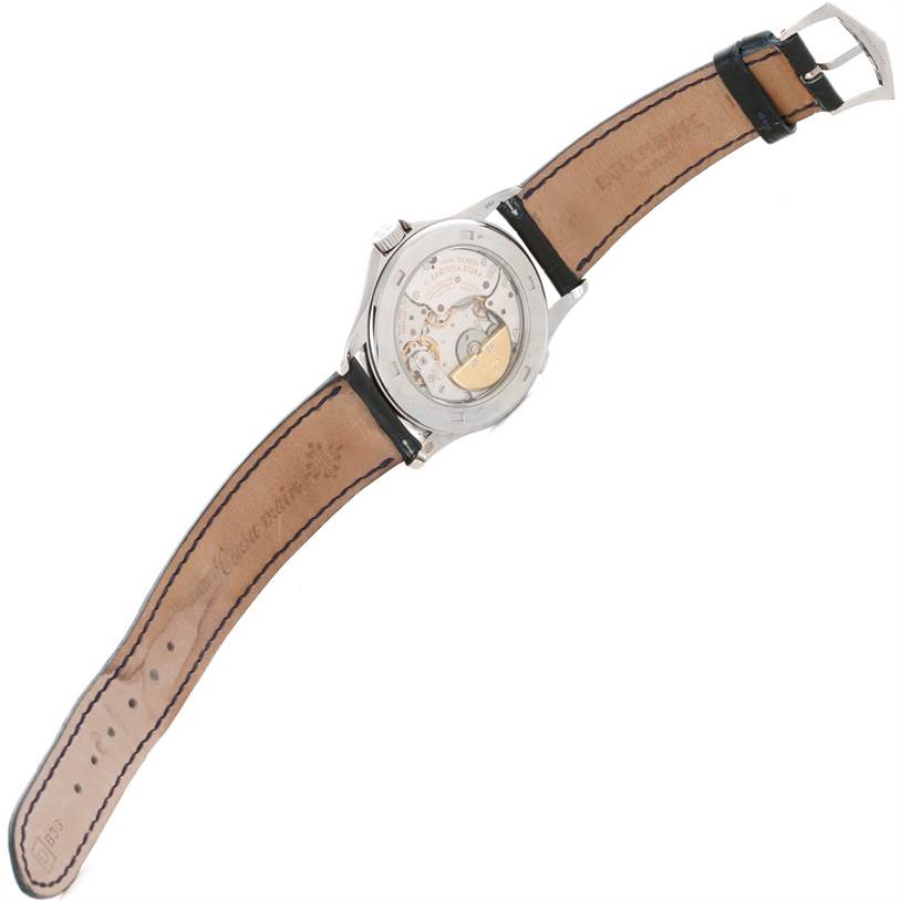 This image shows the back view of a Patek Philippe Complications 3802R Men's White Gold Silver Dial 3802R Men's White Gold Silver Dial watch, displaying the transparent case back and leather strap.