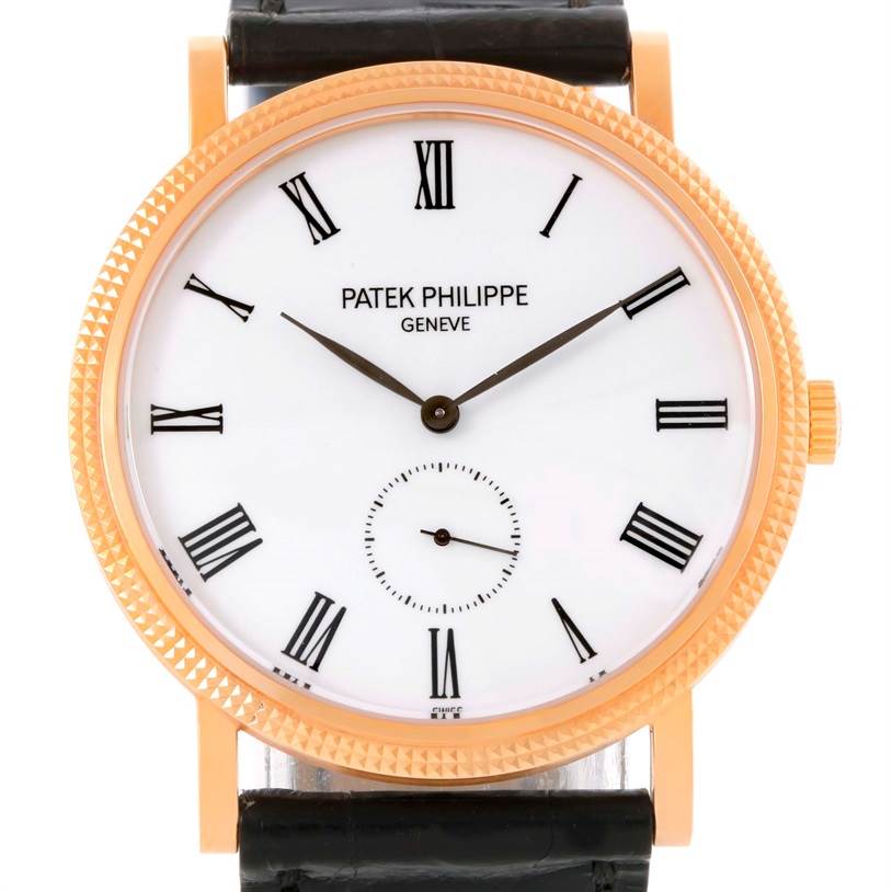 The image shows a front view of the Patek Philippe Calatrava 5119R Men's Rose Gold White Dial 5119R Men's Rose Gold White Dial watch, displaying its dial, hands, case, and a part of the strap.