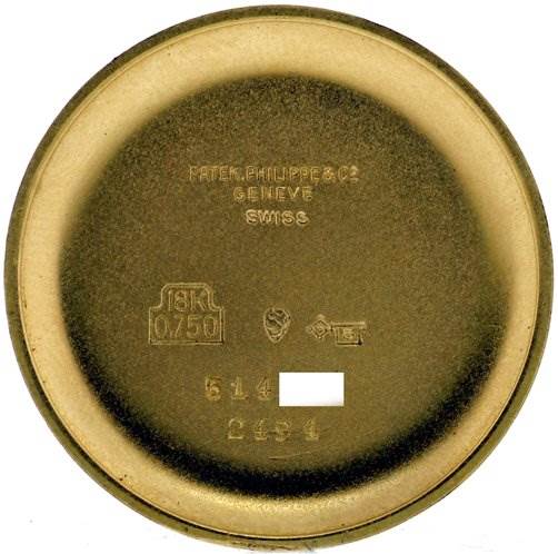 The image shows the inner case back of a Vintage Patek Philippe watch, displaying engravings and hallmarks.