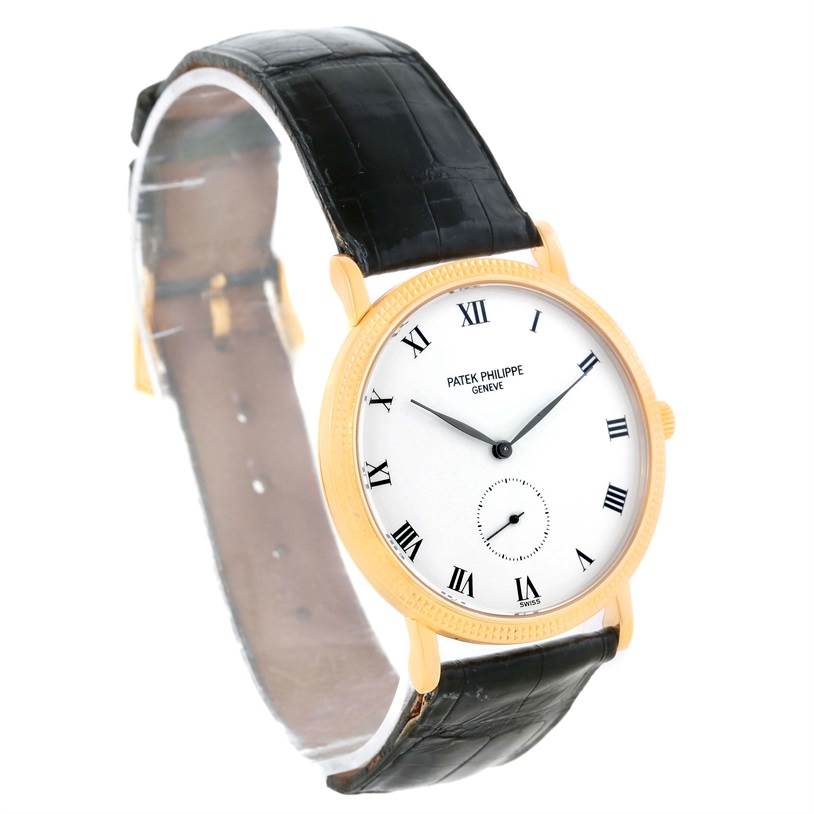 The Patek Philippe Calatrava 3919 Men's Yellow Gold White Dial 3919 Men's Yellow Gold White Dial watch is shown at a front angle, displaying the dial, gold case, and black leather strap.