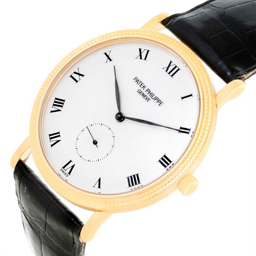 The image shows a Patek Philippe Calatrava 3919 Men's Yellow Gold White Dial 3919 Men's Yellow Gold White Dial watch, displaying its round dial, Roman numerals, and black leather strap from a slight angle.