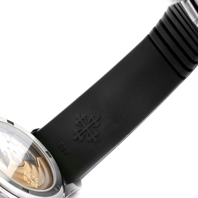 The image shows a close-up of the strap and partial back of a Patek Philippe Aquanaut 5066A Men's Stainless Steel Black Dial 5066A Men's Stainless Steel Black Dial watch, highlighting the logo and strap texture.