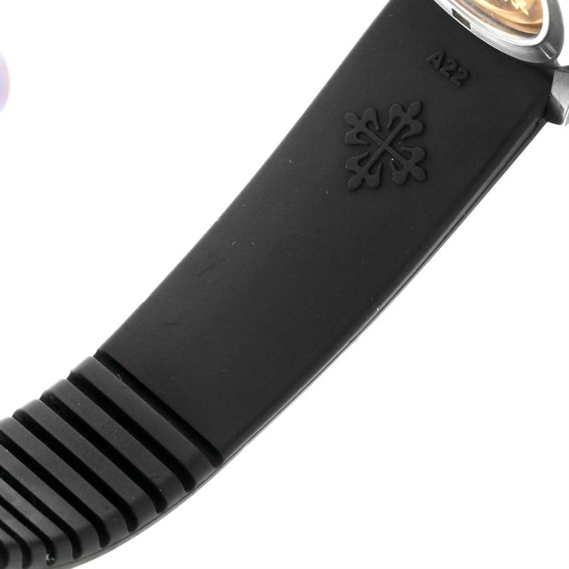This image shows a close-up of the black rubber strap with the logo of the Patek Philippe Aquanaut 5066A Men's Stainless Steel Black Dial 5066A Men's Stainless Steel Black Dial watch.