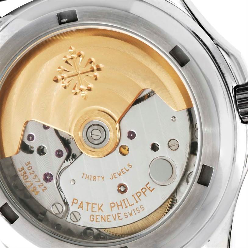 The image shows a close-up of the case back revealing the movement of the Patek Philippe Aquanaut 5066A Men's Stainless Steel Black Dial 5066A Men's Stainless Steel Black Dial watch.