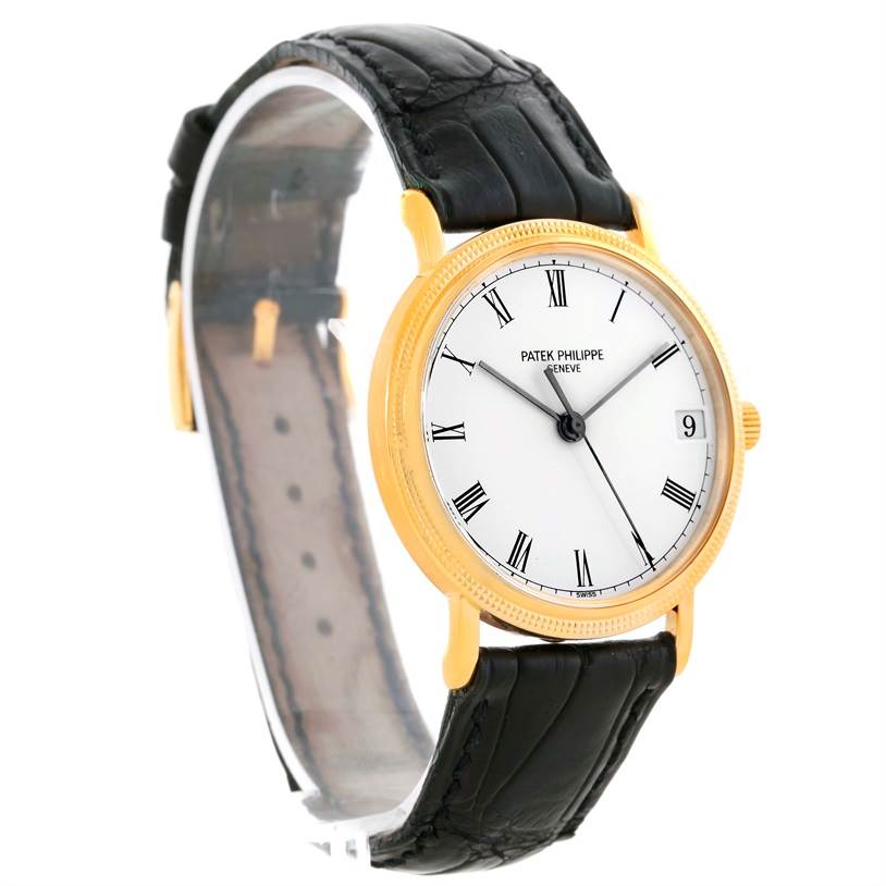 This image shows a Patek Philippe Calatrava 3802 Men's Yellow Gold White Dial 3802 Men's Yellow Gold White Dial watch at an angled side view, displaying the face, bezel, case, and leather strap.