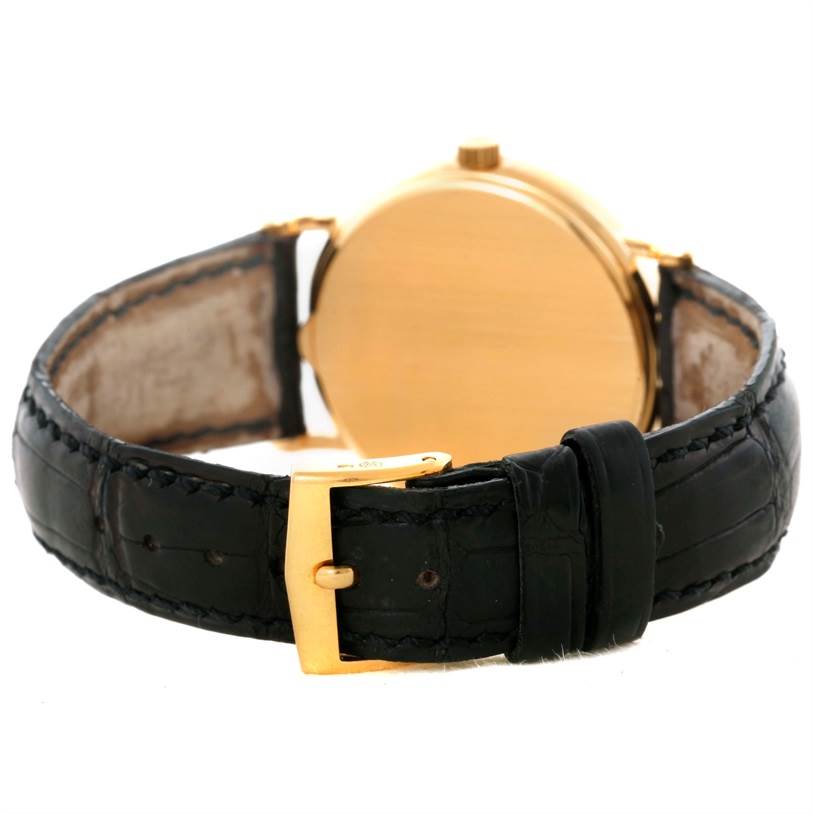 This image shows the back of a Calatrava watch by Patek Philippe, displaying the leather strap and buckle.