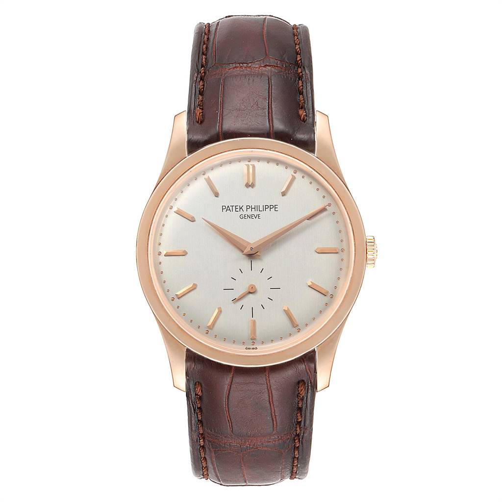 This image shows a front view of the Calatrava model by Patek Philippe, highlighting the face, case, and leather strap.