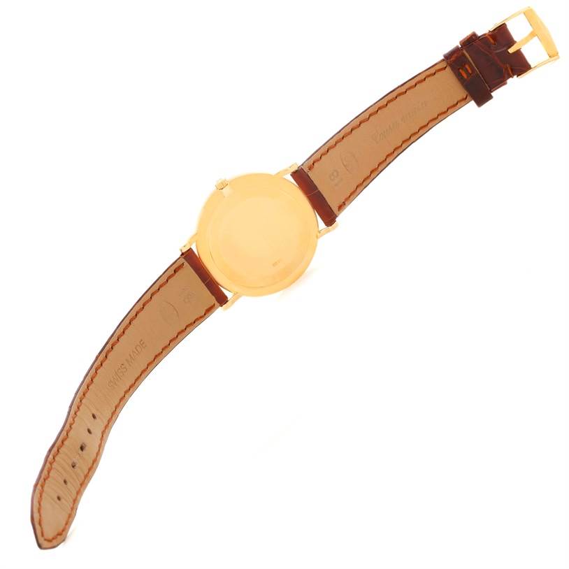 The image shows the back view of a Patek Philippe Calatrava 3919 Men's Yellow Gold White Dial 3919 Men's Yellow Gold White Dial watch with its leather strap fully extended.