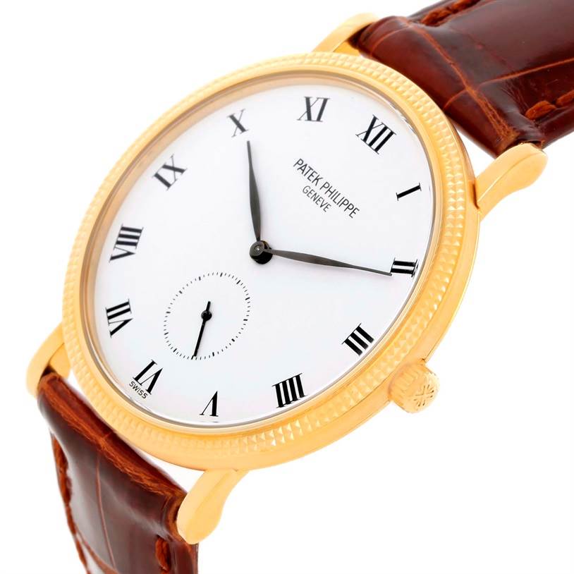 This image shows a side view of a Patek Philippe Calatrava 3919 Men's Yellow Gold White Dial 3919 Men's Yellow Gold White Dial watch with a gold case and brown leather strap.