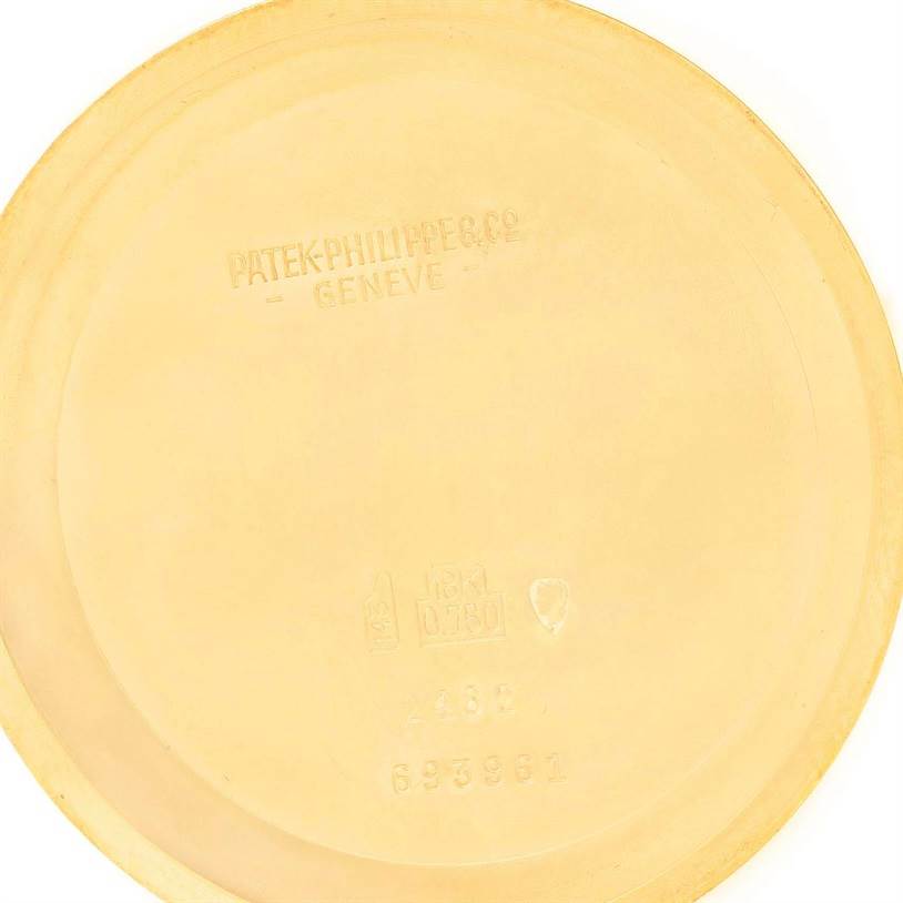 This image shows the inside back cover of a Patek Philippe 2482 Yellow Gold Silver Dial 2482 Yellow Gold Silver Dial Calatrava 18k Yellow Gold Mens Vintage Watch 2482 model.