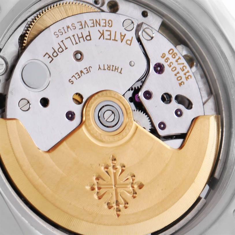 The image shows the movement and internal mechanism of the Patek Philippe Sculpture 5091/1A-001 Women's Stainless Steel White Dial 5091/1A-001 Women's Stainless Steel White Dial model watch from a close-up, angled perspective.