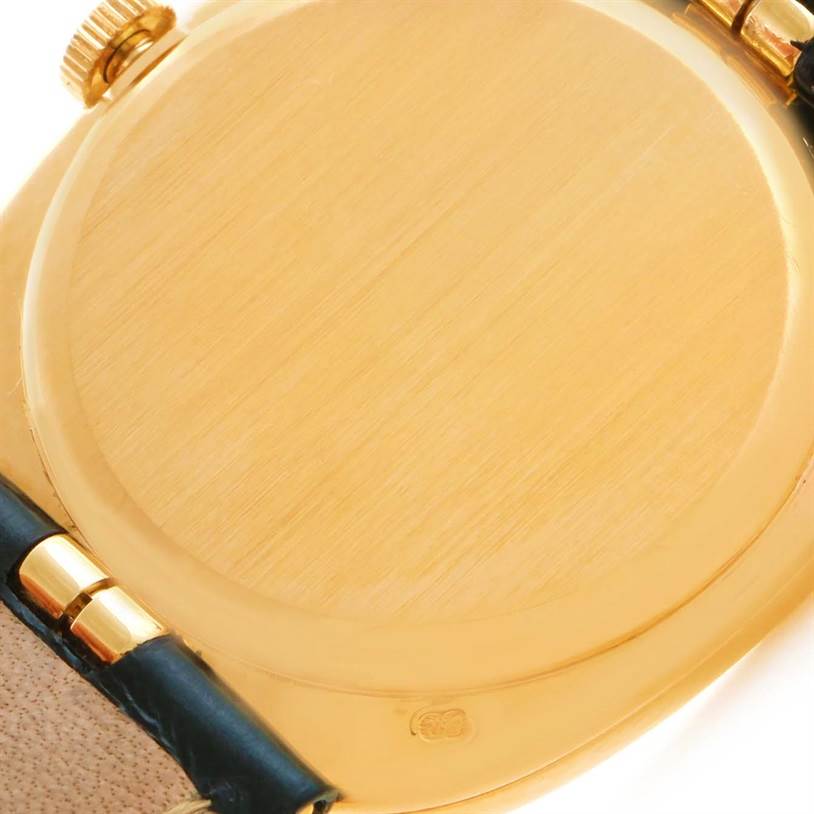 This image shows the backside and the crown of a Patek Philippe Golden Ellipse 3948 Men's Yellow Gold White Dial 3948 Men's Yellow Gold White Dial watch.