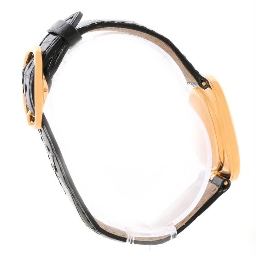 This image shows a side view of the Patek Philippe Golden Ellipse 3948 Men's Yellow Gold White Dial 3948 Men's Yellow Gold White Dial watch, displaying the strap, buckle, and side of the case.