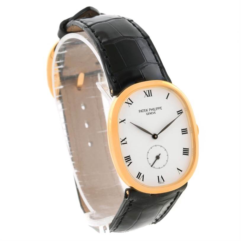 The image shows a Patek Philippe Golden Ellipse 3948 Men's Yellow Gold White Dial 3948 Men's Yellow Gold White Dial watch from a front angle, highlighting its oval face, black leather strap, and gold bezel.