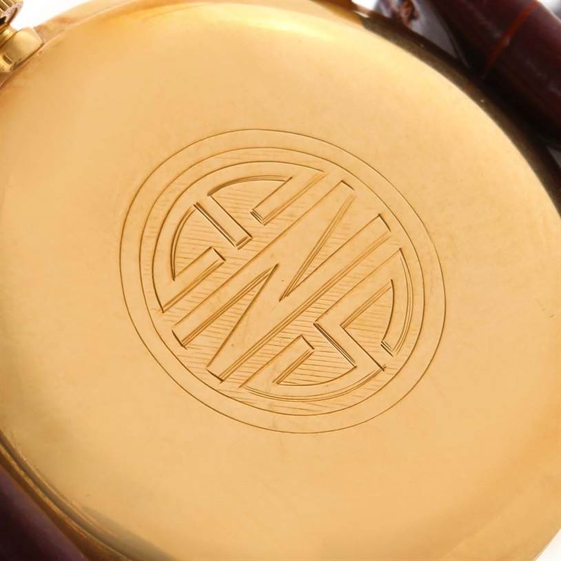 The image shows a close-up of the back case of a Vintage Patek Philippe watch.
