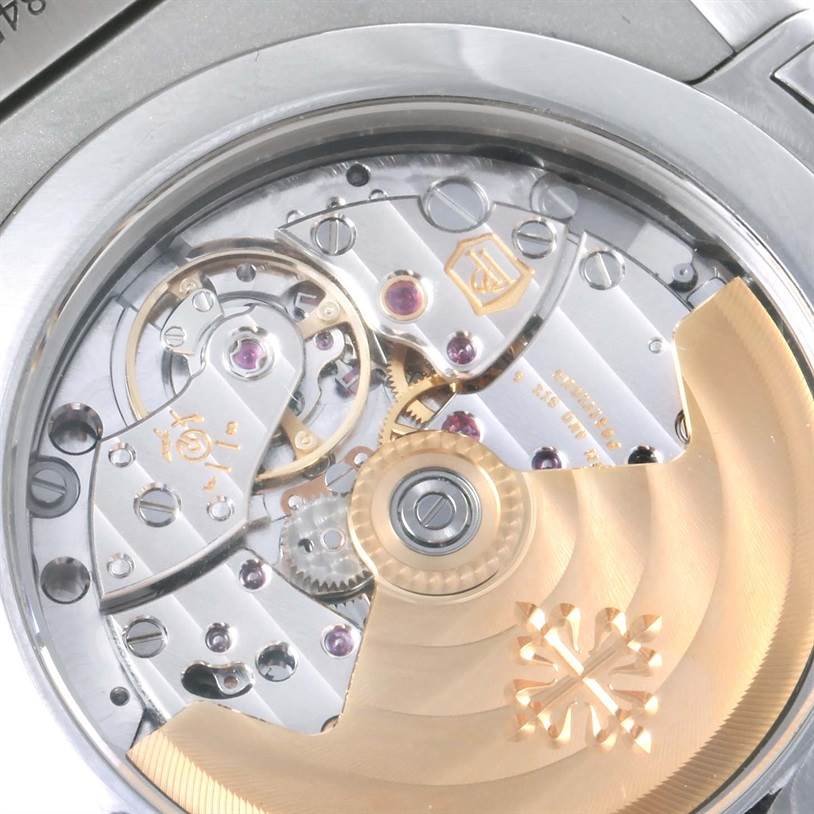 This image shows the intricate movement and rotor from the back side of the Patek Philippe Nautilus 5726/1A-010 Men's Stainless Steel White Dial 5726/1A-010 Men's Stainless Steel White Dial watch model.