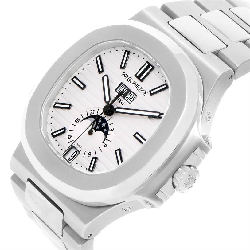 The image shows a Patek Philippe Nautilus 5726/1A-010 Men's Stainless Steel White Dial 5726/1A-010 Men's Stainless Steel White Dial watch at an angled view, highlighting the face, crown, and part of the bracelet.