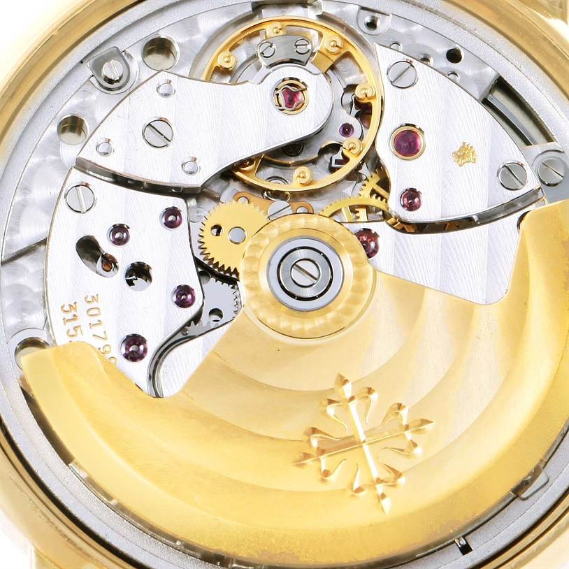 This image shows a close-up view of the movement mechanism of a Patek Philippe Calatrava 3802 Men's Yellow Gold White Dial 3802 Men's Yellow Gold White Dial watch.