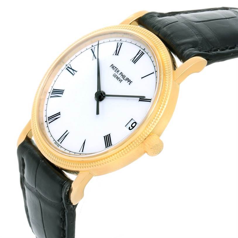 The image shows a side angle of a Patek Philippe Calatrava 3802 Men's Yellow Gold White Dial 3802 Men's Yellow Gold White Dial watch, highlighting the dial, case, crown, and leather strap.