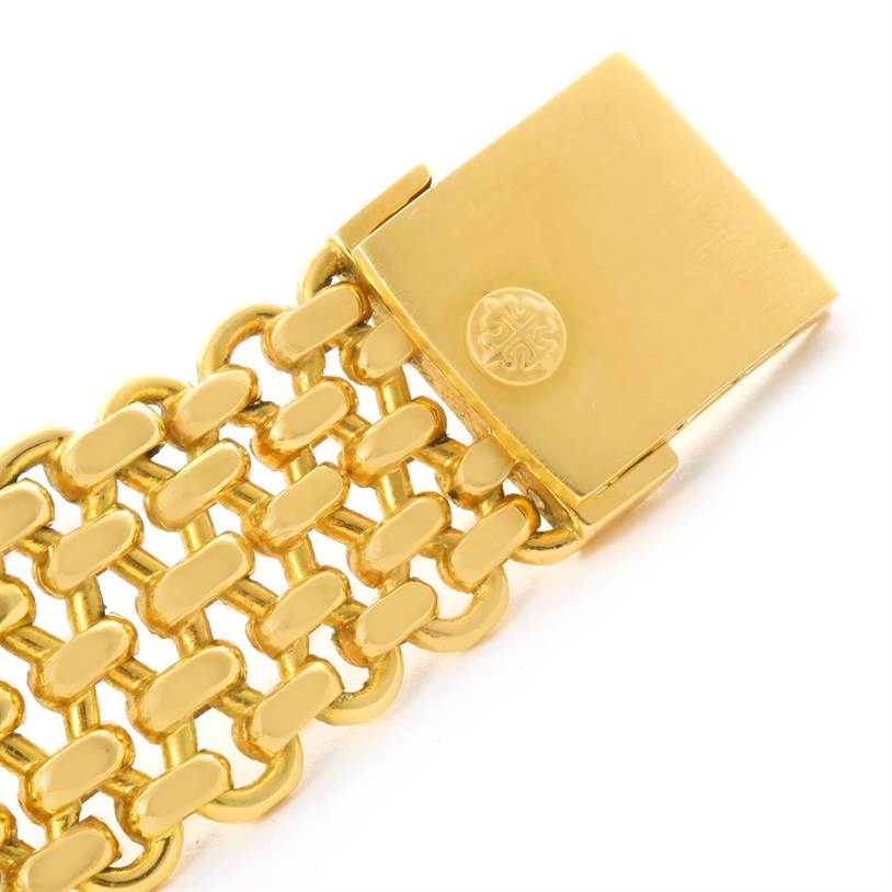 This image shows the clasp and part of the bracelet of the Patek Philippe 3648 Yellow Gold Blue Dial 3648 Yellow Gold Blue Dial Golden Ellipse 18k Yellow Gold Blue Dial Watch 3648 model.