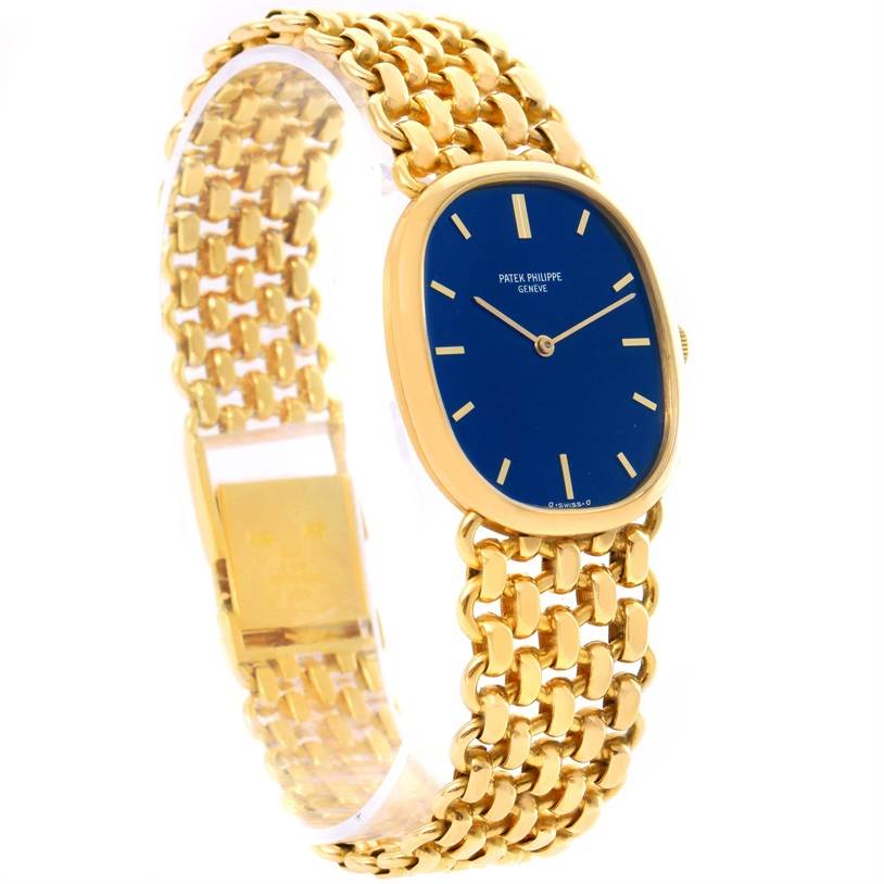 The image shows a side angle of the Patek Philippe 3648 Yellow Gold Blue Dial 3648 Yellow Gold Blue Dial Golden Ellipse 18k Yellow Gold Blue Dial Watch 3648, highlighting the watch face and bracelet.