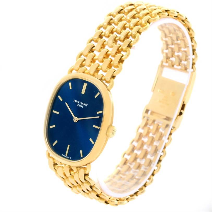 The image shows a frontal angle of the Patek Philippe 3648 Yellow Gold Blue Dial 3648 Yellow Gold Blue Dial Golden Ellipse 18k Yellow Gold Blue Dial Watch 3648 with its blue dial and gold bracelet.