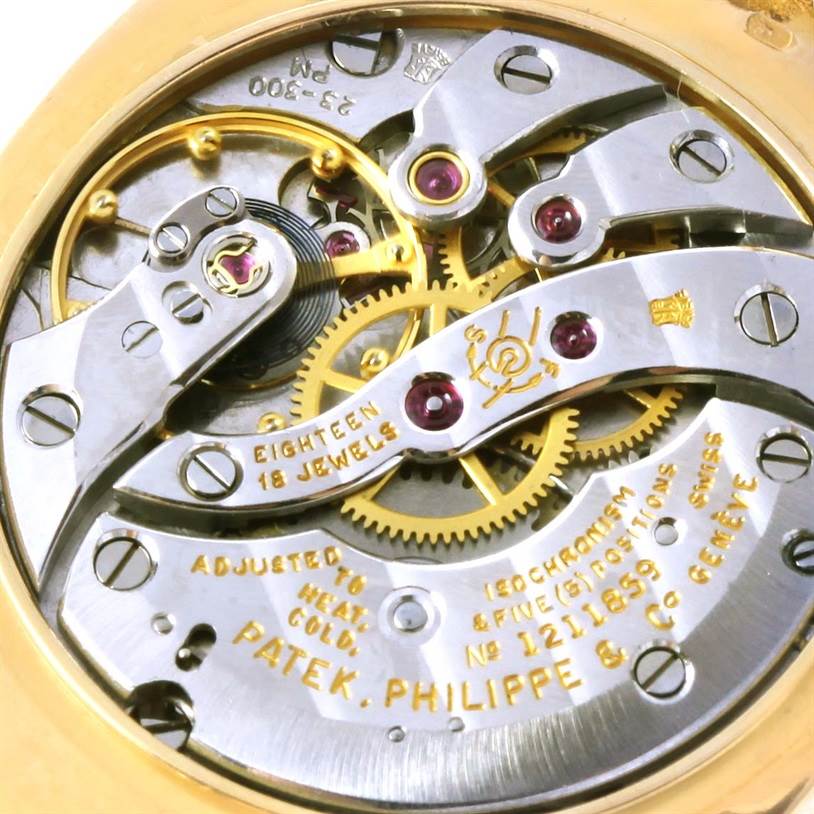 The image shows a close-up view of the movement of a Patek Philippe 3648 Yellow Gold Blue Dial 3648 Yellow Gold Blue Dial Golden Ellipse 18k Yellow Gold Blue Dial Watch 3648 model.
