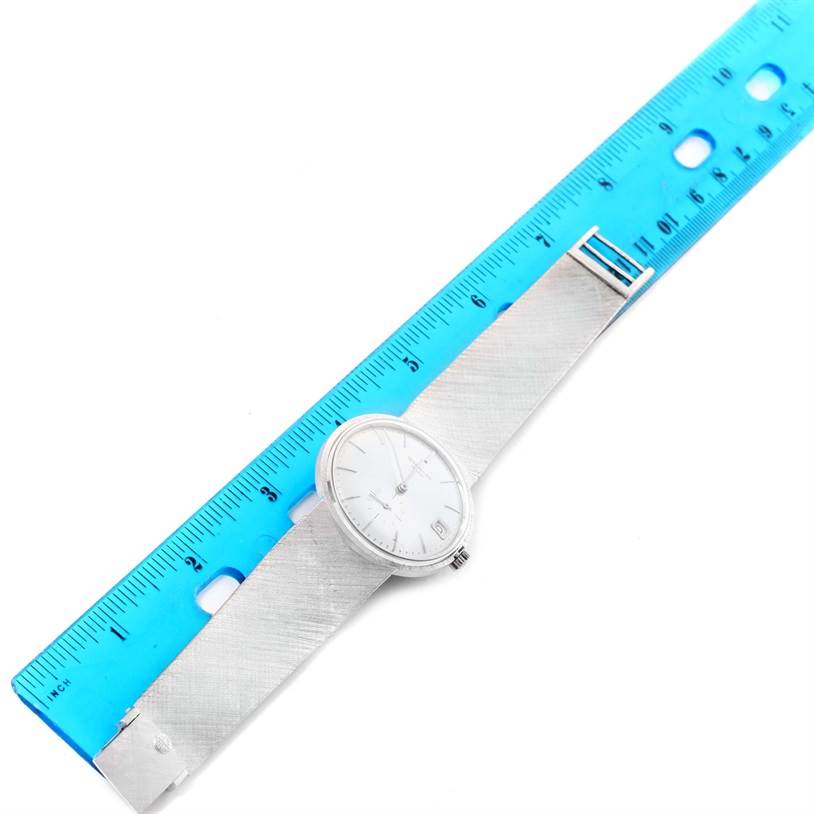 The image shows a Patek Philippe Vintage model watch from a top-down angle, alongside a blue ruler.