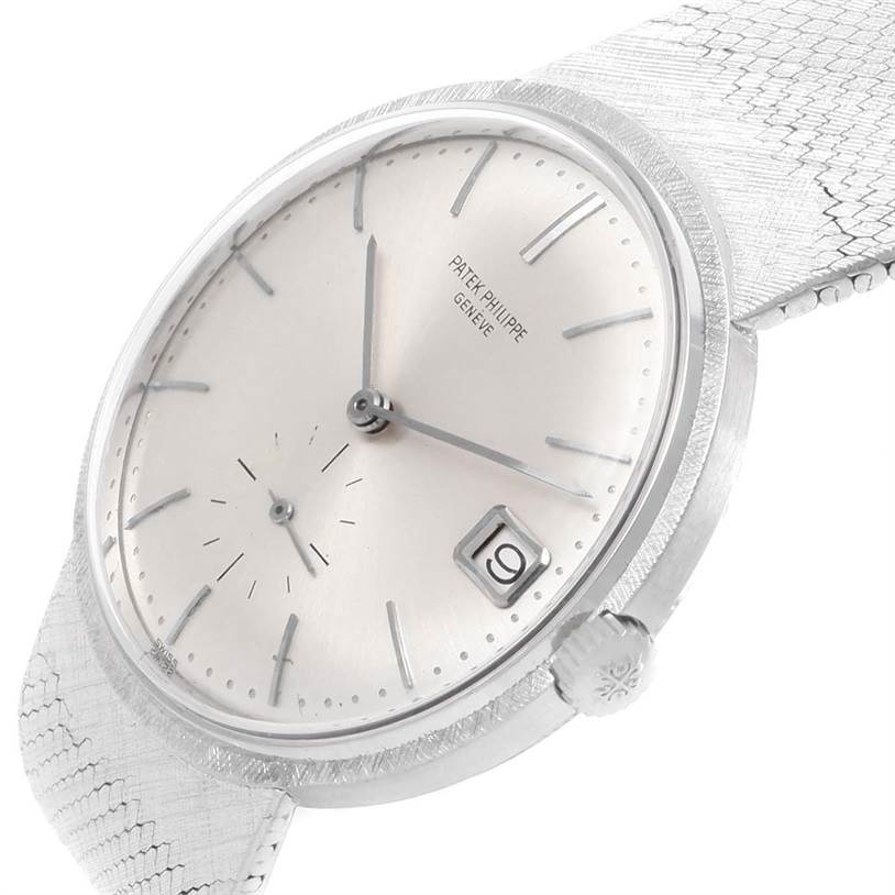 This image shows a side angle of the Patek Philippe Vintage watch displaying the dial, crown, and part of the band.