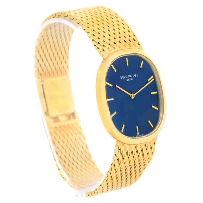 The image shows a Patek Philippe Golden Ellipse 3748 Men's Yellow Gold Blue Dial 3748 Men's Yellow Gold Blue Dial watch angled to display the face, band, and clasp.