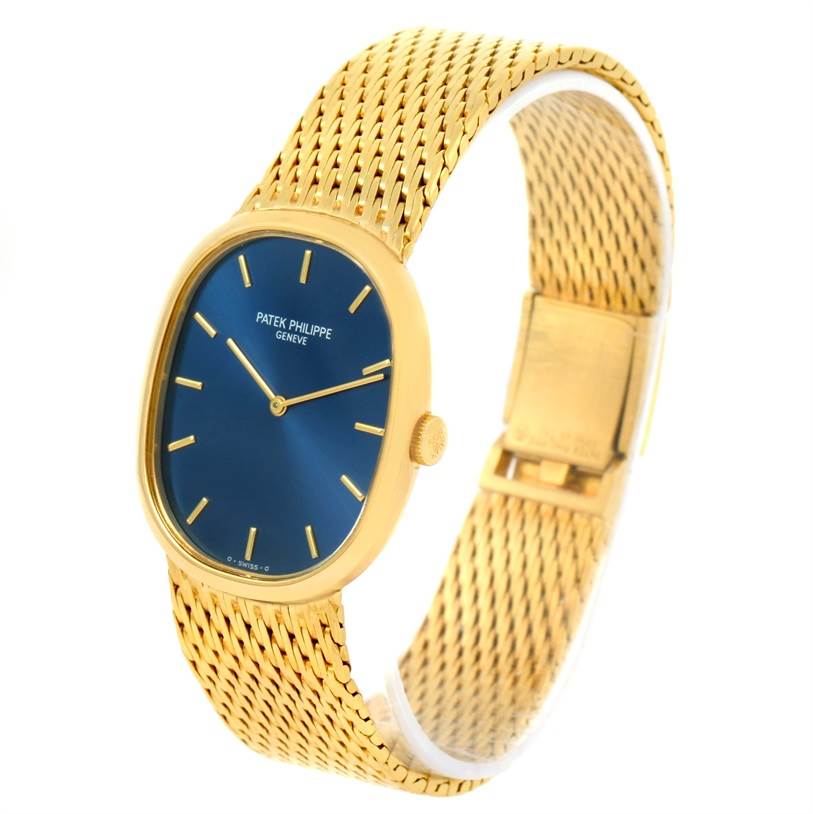 The image shows a Patek Philippe Golden Ellipse 3748 Men's Yellow Gold Blue Dial 3748 Men's Yellow Gold Blue Dial watch at an angled view, highlighting its blue dial, gold case, and textured gold bracelet.