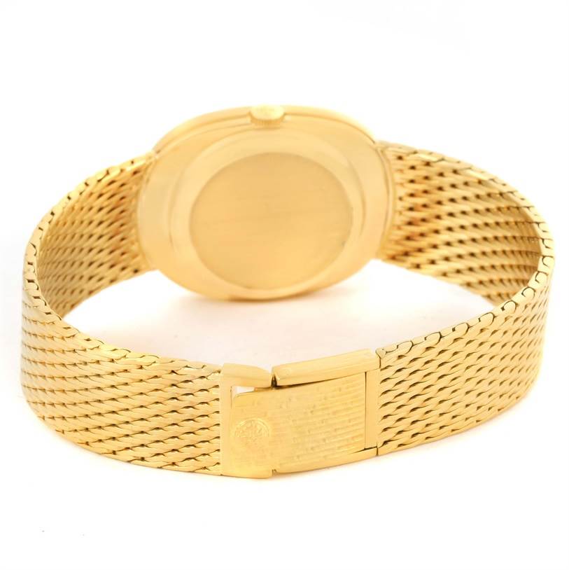 The image shows the back view of a Patek Philippe Golden Ellipse 3748 Men's Yellow Gold Blue Dial 3748 Men's Yellow Gold Blue Dial watch, highlighting its case and clasp.