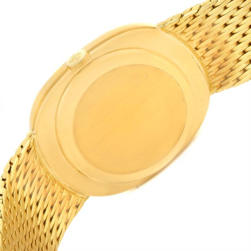 The image shows the back case and part of the strap of the Patek Philippe Golden Ellipse 3748 Men's Yellow Gold Blue Dial 3748 Men's Yellow Gold Blue Dial watch from a slightly angled side view.