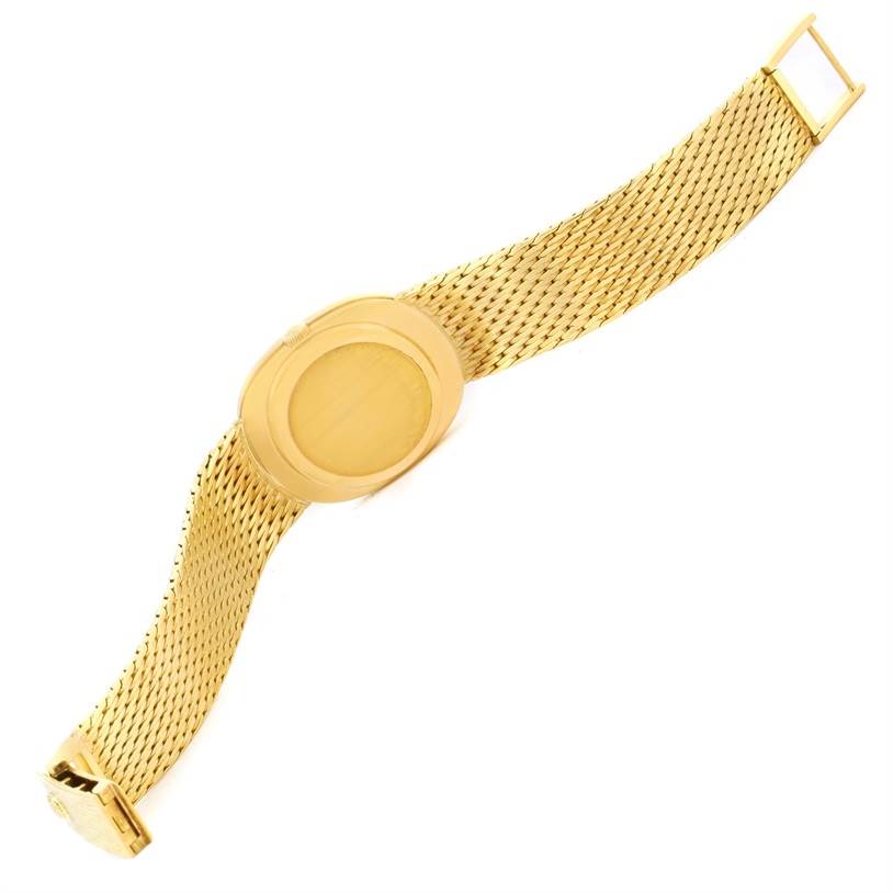 The image shows the front view of a Patek Philippe Golden Ellipse 3748 Men's Yellow Gold Blue Dial 3748 Men's Yellow Gold Blue Dial watch with its gold bracelet fully extended.