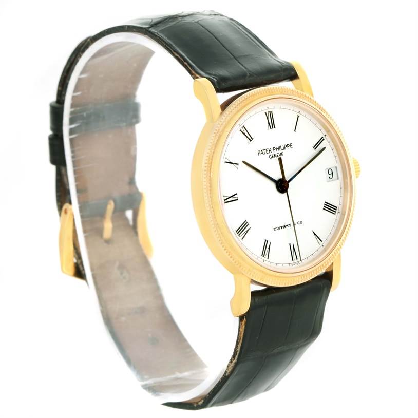 The Patek Philippe Calatrava 3802 Men's Yellow Gold White Dial 3802 Men's Yellow Gold White Dial watch is shown from a front-left angle, displaying its face, bezel, lugs, and leather strap.
