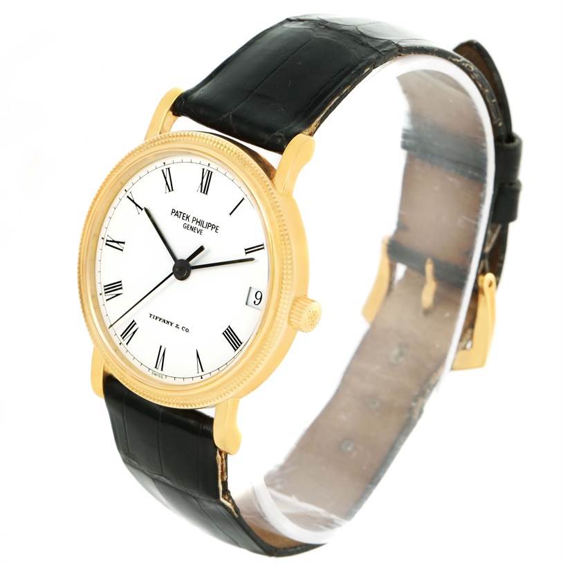 The image shows a Patek Philippe Calatrava 3802 Men's Yellow Gold White Dial 3802 Men's Yellow Gold White Dial watch at a three-quarter angle, displaying the face, crown, and leather strap.