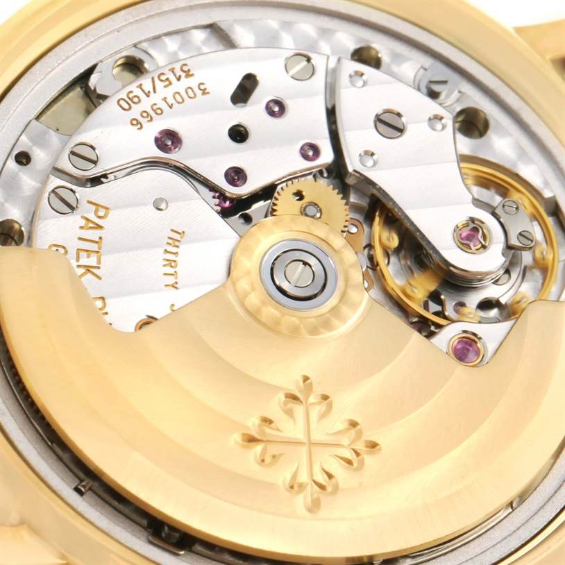 This image shows the intricate movement mechanism of the Calatrava model by Patek Philippe, viewed from the back.