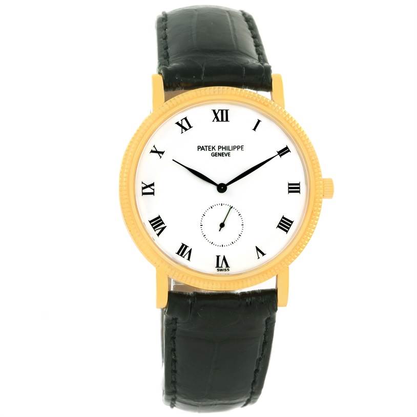 The image shows a front view of a Patek Philippe Calatrava 3919 Men's Yellow Gold White Dial 3919 Men's Yellow Gold White Dial watch with a white dial, black Roman numerals, and a black leather strap.