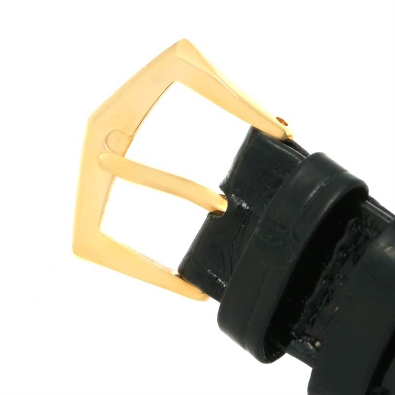 The image shows a close-up of the gold buckle and black leather strap of a Patek Philippe Calatrava 3919 Men's Yellow Gold White Dial 3919 Men's Yellow Gold White Dial watch.