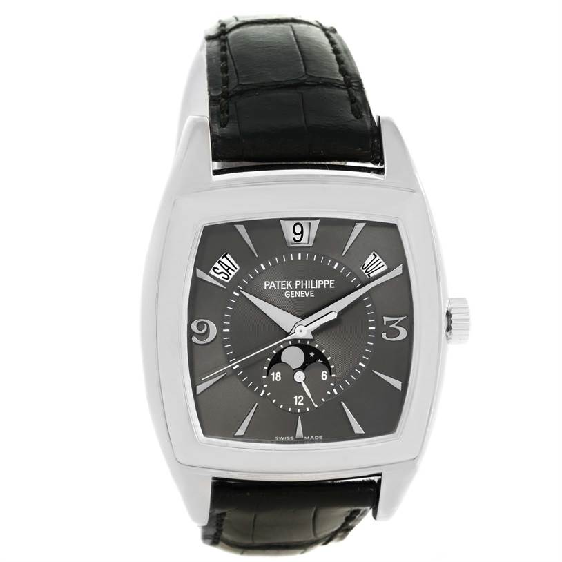 This image shows a frontal view of the Patek Philippe Gondolo 5135G Men's White Gold Black Dial 5135G Men's White Gold Black Dial watch, highlighting its dial, hands, and black strap.