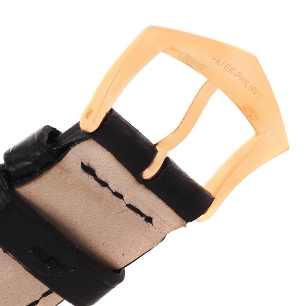 This image shows a close-up angle of the buckle and strap of a Patek Philippe Calatrava 5119 Men
s Rose Gold White Dial 5119 Men
s Rose Gold White Dial watch.