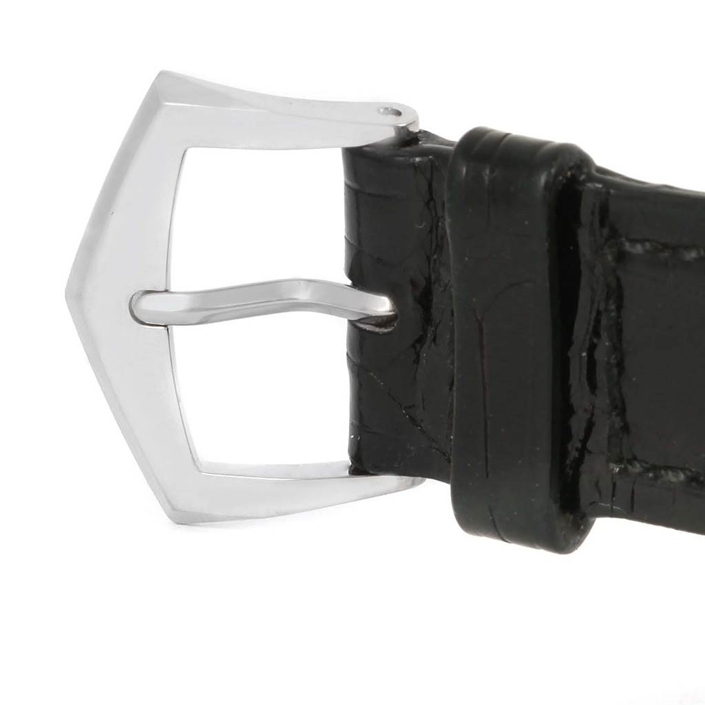This image shows the buckle and part of the black leather strap of a Patek Philippe Calatrava 5120G Men's White Gold White Dial 5120G Men's White Gold White Dial watch.
