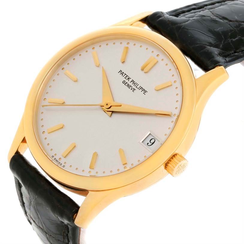 This image shows a front-side view of a Patek Philippe Calatrava 3998 Men's Yellow Gold Silver Dial 3998 Men's Yellow Gold Silver Dial watch, including the face, hands, crown, and strap.
