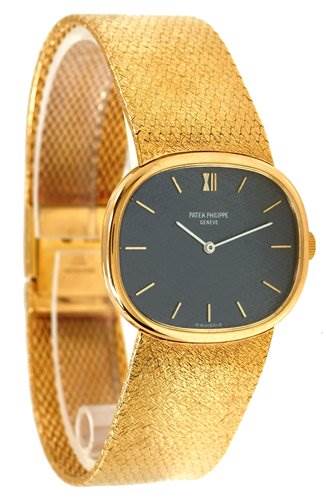 The image shows a side angle of the Patek Philippe 3845/2 YEAR 1978 Yellow Gold Black Dial 3845/2 YEAR 1978 Yellow Gold Black Dial Vintage Men 18k Gold Ellipse 3845/2 watch, highlighting its gold band and face.
