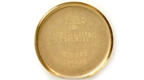 The image shows the inside back cover of a Patek Philippe 3845/2 YEAR 1978 Yellow Gold Black Dial 3845/2 YEAR 1978 Yellow Gold Black Dial Ellipse 3845/2 watch, with engravings.