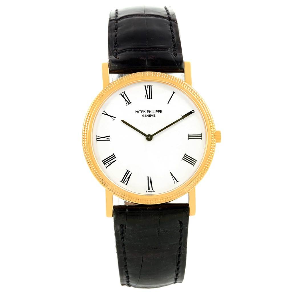 This image shows a front view of a Patek Philippe Calatrava 3520 Men's Yellow Gold White Dial 3520 Men's Yellow Gold White Dial watch, featuring its gold case, white dial with Roman numerals, and black leather strap.