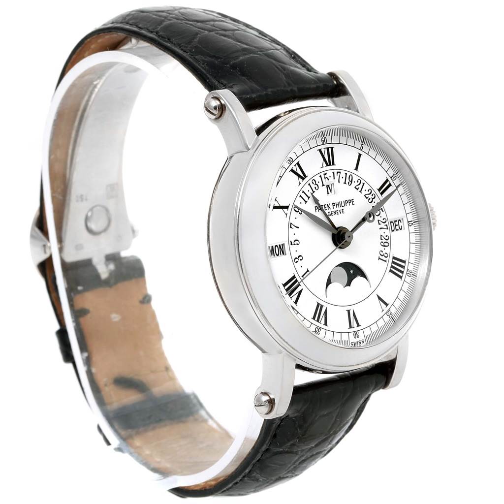 The image shows a side-angle view of a Patek Philippe 5059 Men
s White Gold White Dial 5059 Men
s White Gold White Dial Perpetual Calendar Retrograde 18k White Gold Watch 5059, highlighting the dial and strap.
