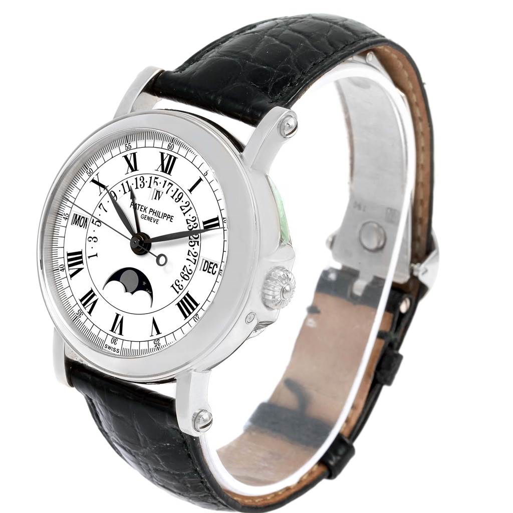 The image shows the front and side of a Patek Philippe 5059 Men
s White Gold White Dial 5059 Men
s White Gold White Dial Perpetual Calendar Retrograde 18k White Gold Watch 5059 with black leather strap.